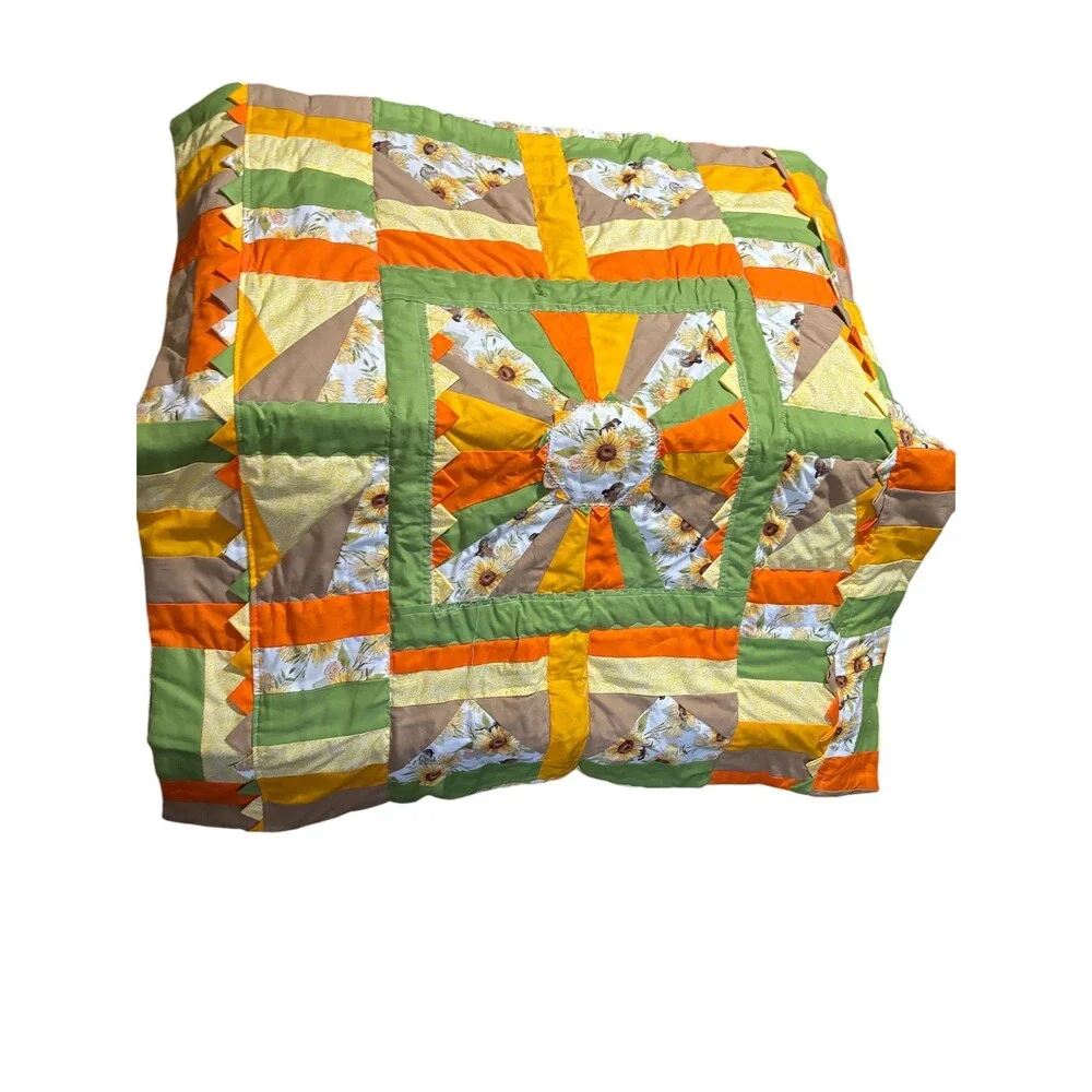 Cheerful,happy, colorful sunflower theme lap quilt or baby quilt. 41” x 40”